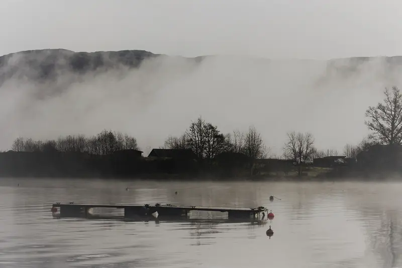 Mist rising over the still waters of Loch Ness, Scotland