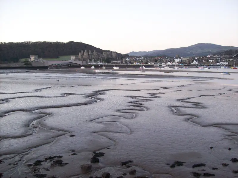 Conwy Castle and the estuary at low tide, North Wales