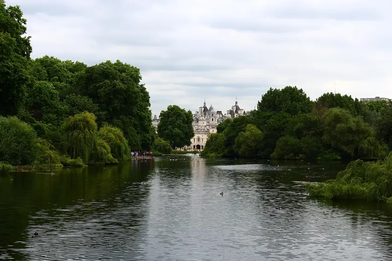 Serpentine lake and parkland trees in Hyde Park, London