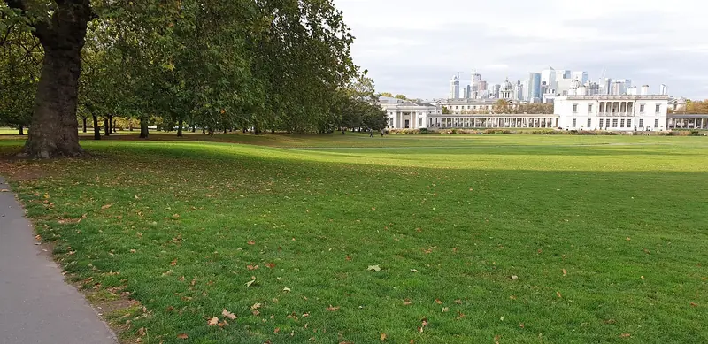 Greenwich Park lawns with the London skyline in the distance