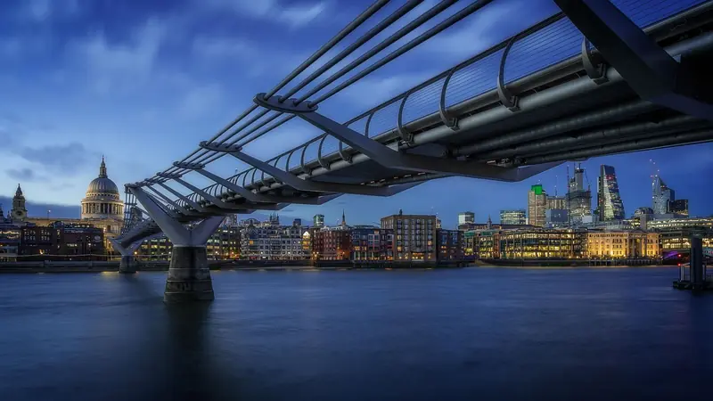 Millennium Bridge and St Paul's Cathedral at blue hour, London