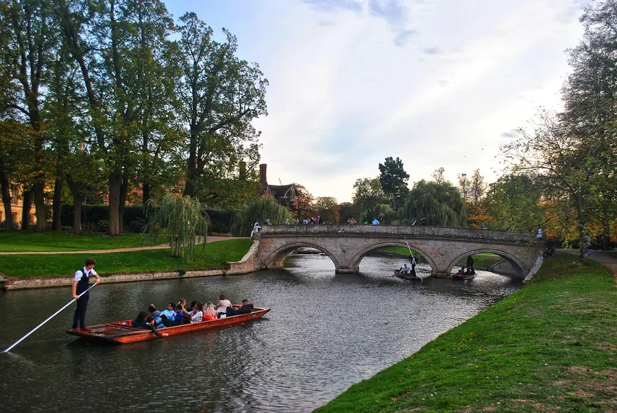Punting boats on the River Cam beside historic Cambridge colleges
