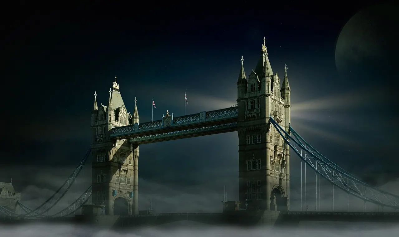 Tower Bridge illuminated at dusk over the River Thames, London