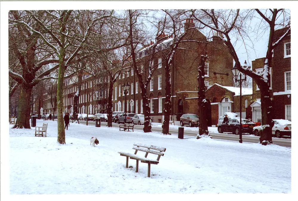 Snowy winter street scene in London, England