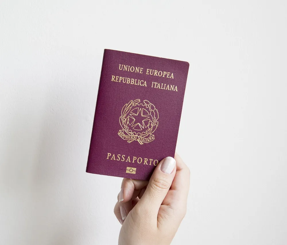 Passport and travel documents on an airport counter